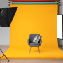 professional studio setup with cinematic lighting and backdrop for commercial video production